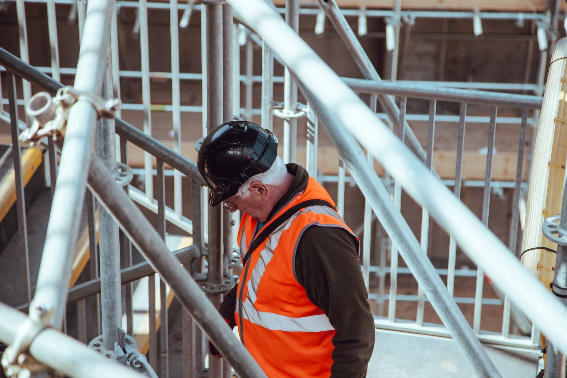 Scaffold Inspection of a senior safety inspector showing how to operate nail guns correctly and safety